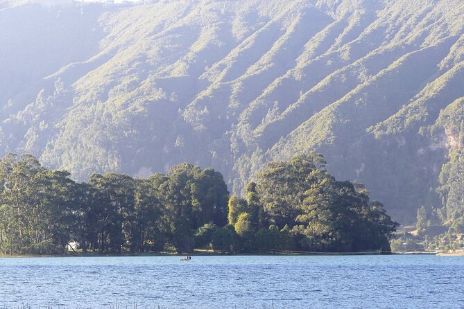 Stunning Views Wonchi Crater Lake a Private Day Trip - The lake boat ride and Cherkos: faith, birds, and a calm pause